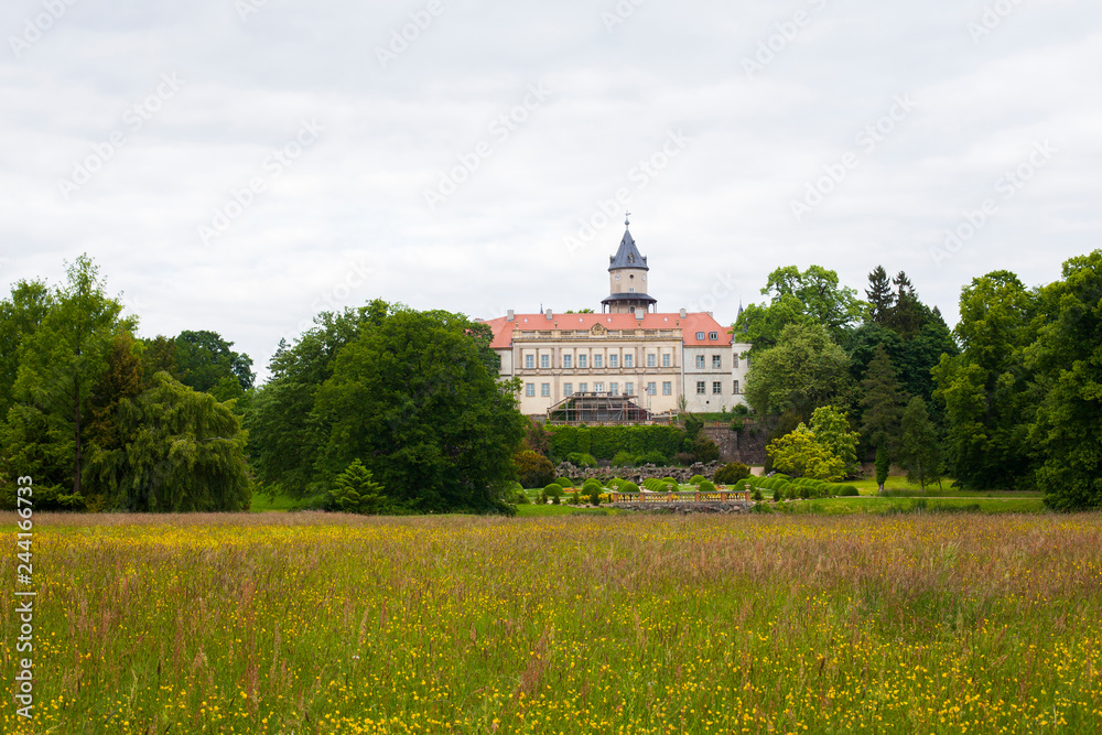 Wiesenburg, Mark / Germany - May 2015: The Wiesenburg Palace, a medieval castle that has been partially transformed into a neo-renaissance palace and its park.