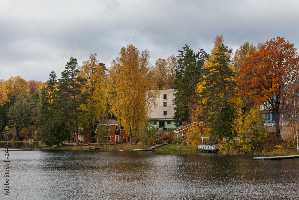 Houses on the shore of the lake ar fall season. Nelijarve, Estonia.