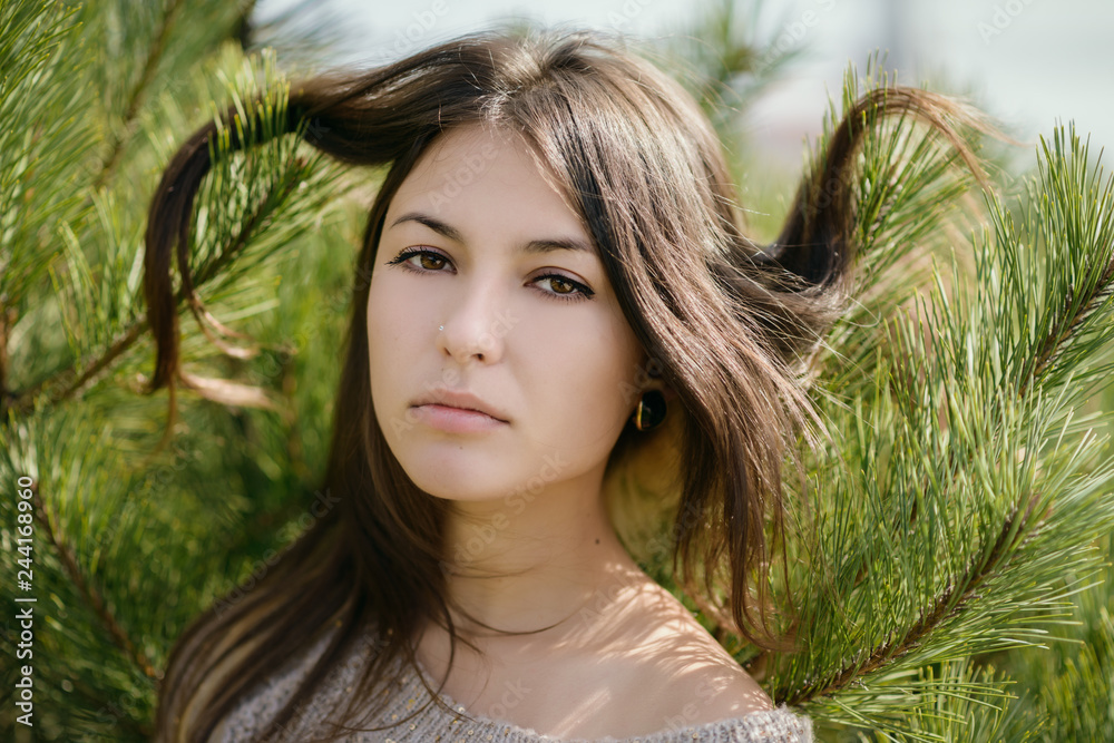 Portrait of young beautiful woman in sweater. Shallow depth of field. Portrait of young beautiful woman in sweater. Shallow depth of field.