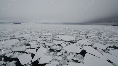 Travel on the icebreaker in the ice, Antarctica photo