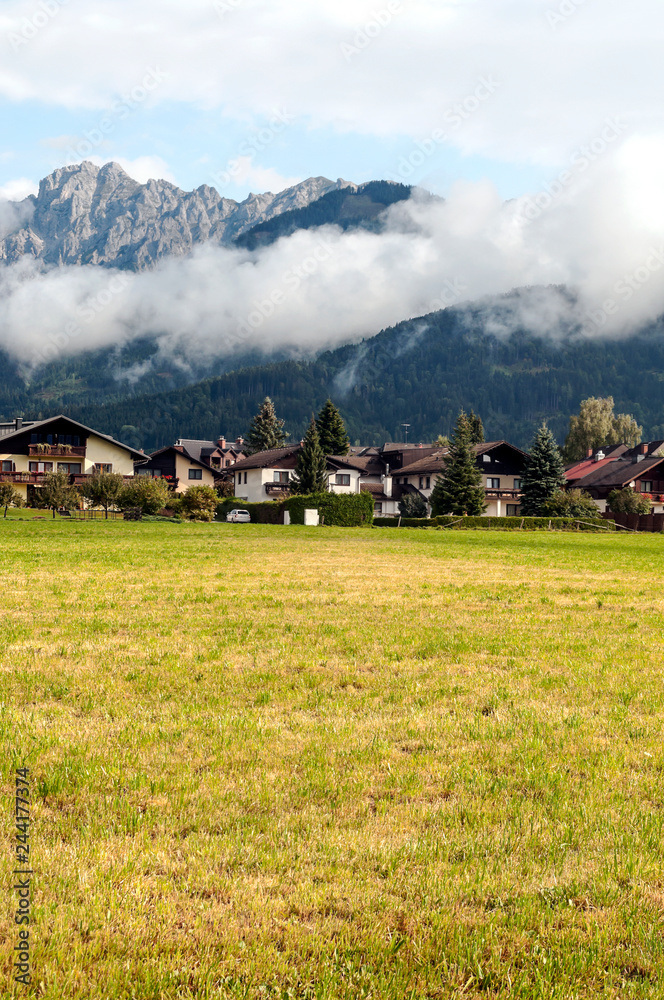 Rural village in the Austrian Alps on a cloudy day