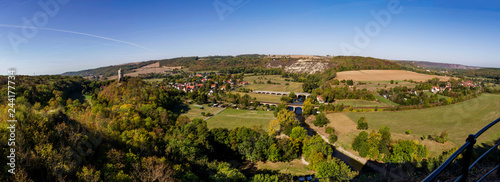 Panoramic view of the village of Saalek and train in the valley of the river Saale. Tourist place Sachsen-Anhalt, Germany. photo