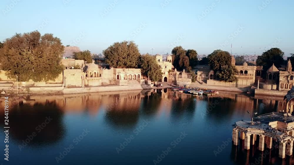 Aerial view 4k video by drone of Shrines And Temples At Gad sisar Lake, Jaisalmer, India - Rajasthan. Aerial view 4k video by drone of Shrines And Temples At Gad sisar Lake, Jaisalmer, India - Rajasthan.
