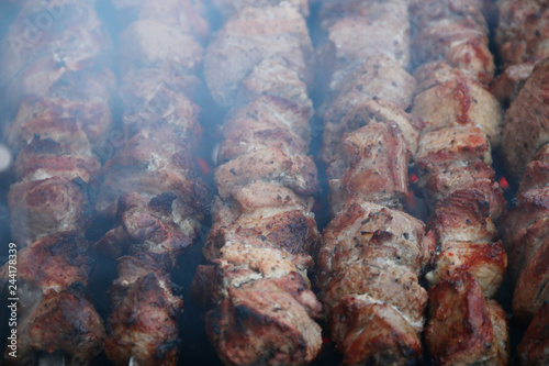 skewers with smoke background. BBQ meat kebab