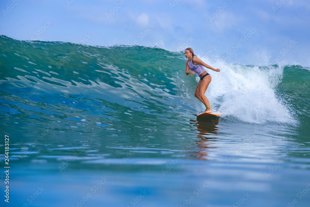 Fototapeta premium Woman surfing