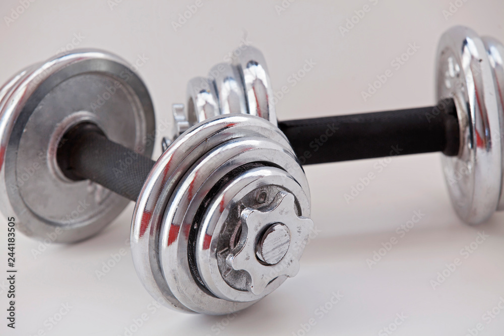 Naklejka premium Fitness exercise equipment dumbbell weights on white background