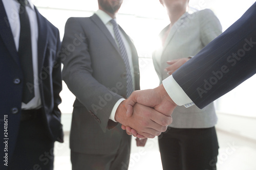business leader shaking hands with the investor