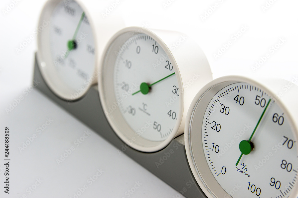 modern, round barometer, thermometer, hygrometer. Analog device for  measuring humidity, temperature and atmospheric pressure. Stock Photo |  Adobe Stock