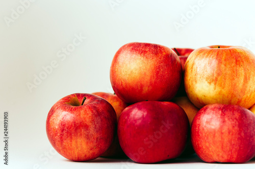 Fresh ripe red apples on white background, vegetarian concept.