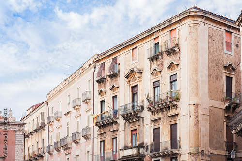 Travel to Italy - historical street of Catania, Sicily, facade of ancient buildings.