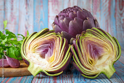 carciofi viola crudi e closeup con  ingredienti photo