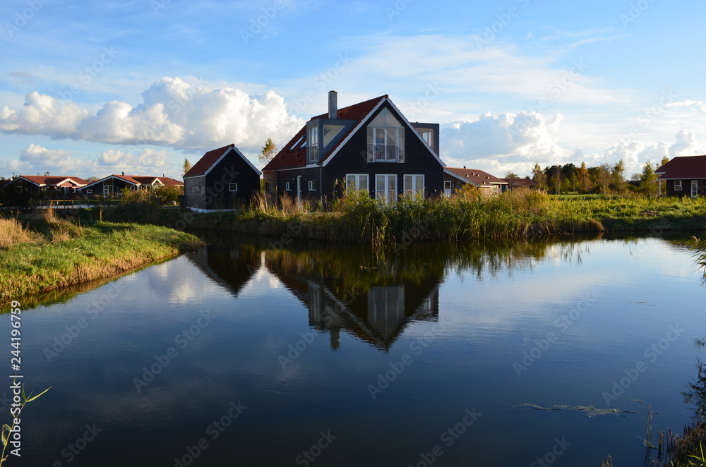 Fototapeta premium house and reflection in the lake