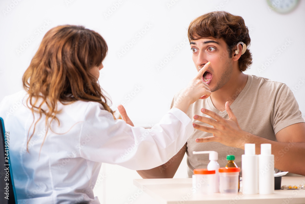 Patient with hearing problem visiting doctor otorhinolaryngologi Patient with hearing problem visiting doctor otorhinolaryngologi