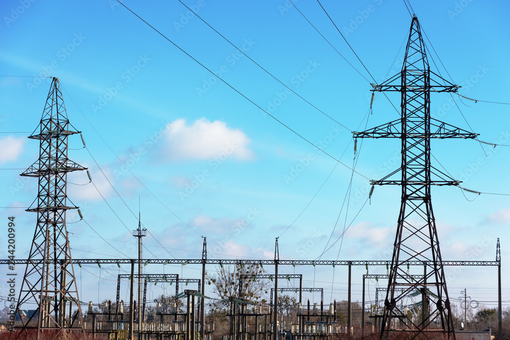 View of electrics, electric lines on the background of blue sky and good weather. View of electrics, electric lines on the background of blue sky and good weather.