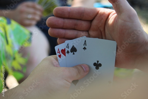 playing cards in a hand