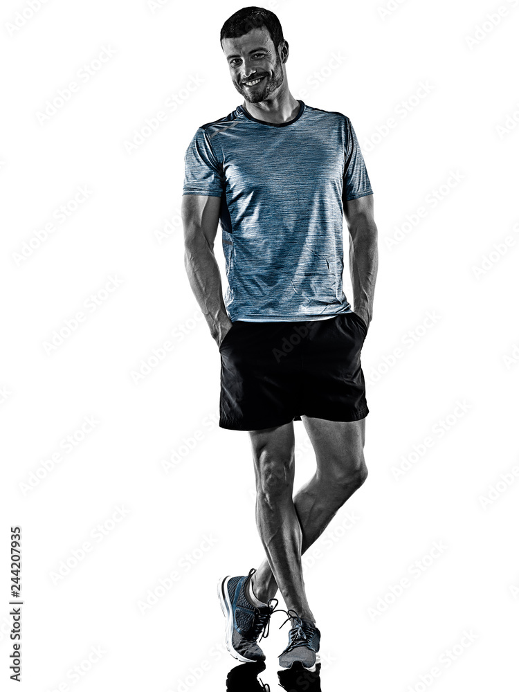 one caucasian man runner jogger standing isolated on white background with shadows one caucasian man runner jogger standing isolated on white background with shadows