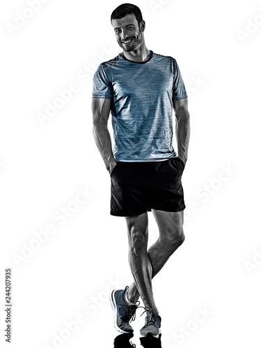 one caucasian man runner jogger standing  isolated on white background with shadows © snaptitude