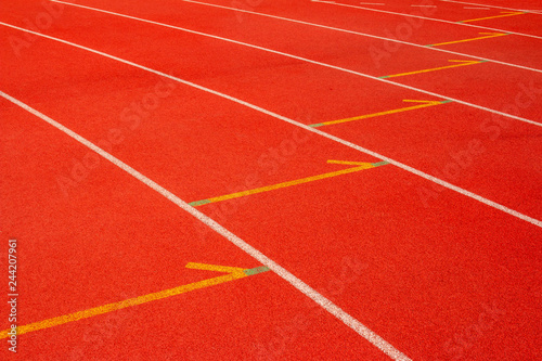 Red running track Synthetic rubber on the athletic stadium.