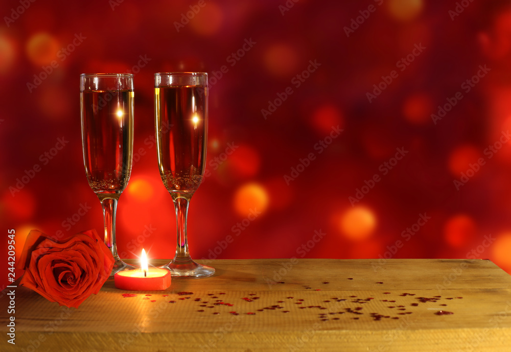 Valentines day background with two of champagne over blur background Valentines day background with two of champagne over blur background