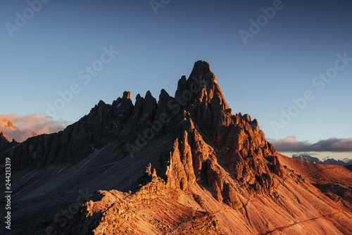 Photo of the big dolomite mountain of Paternkofel at sunset time
