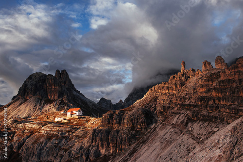 The whims of nature creates unbelievable spectacle. Touristic buildings waiting for the people who wants goes through these amazing dolomite mountains