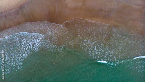 Beautiful aerial view of a beach with waves