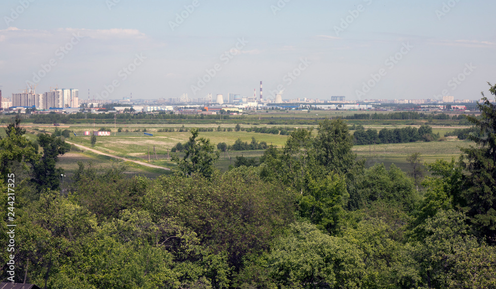 view of the southern areas of new buildings of St. Petersburg from the side of the Pulkovo Heights view of the southern areas of new buildings of St. Petersburg from the side of the Pulkovo Heights