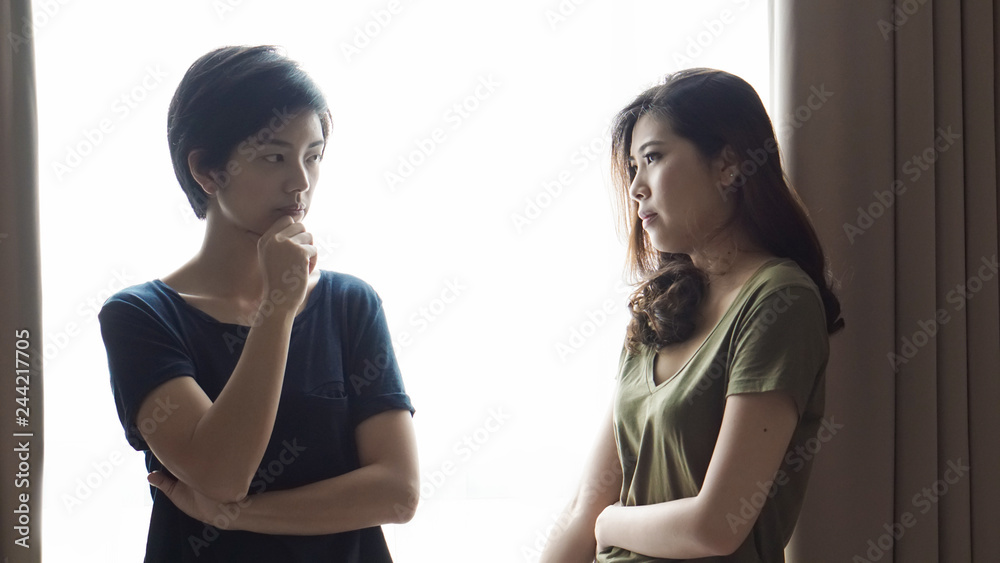 Asian women friends stress on difficult situation, fighting problems