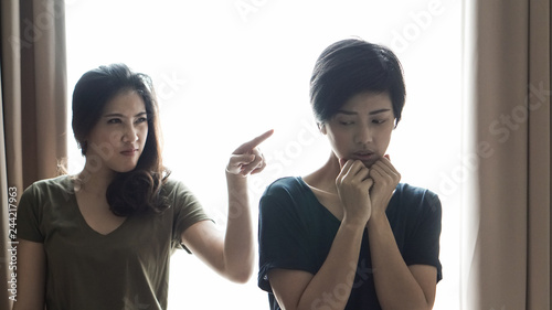 Billede på lærred Two Asian women fight, bully, jealous friend and relationship problem