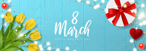 International Women's Day horizontal banner. Vector illustration with realistic yellow tulips flowers, gift box, ring box, candles, glowing garland and golden confetti. Greeting card for 8 March.