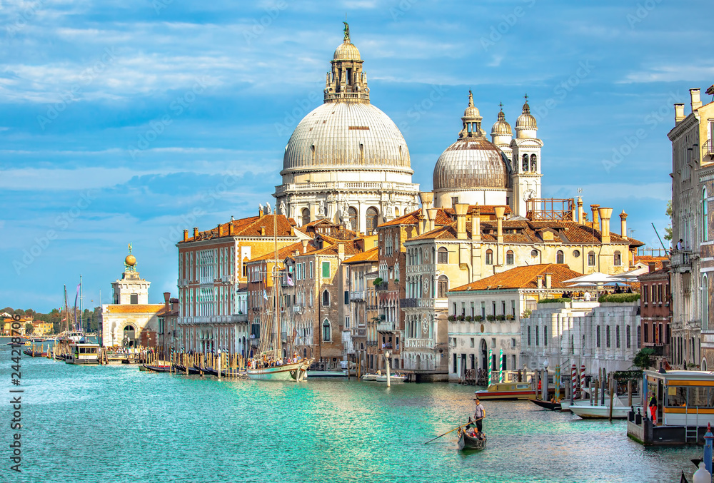 Italy beauty, cathedral Santa Maria della Salute and gondola on Grand canal in Venice , Venezia