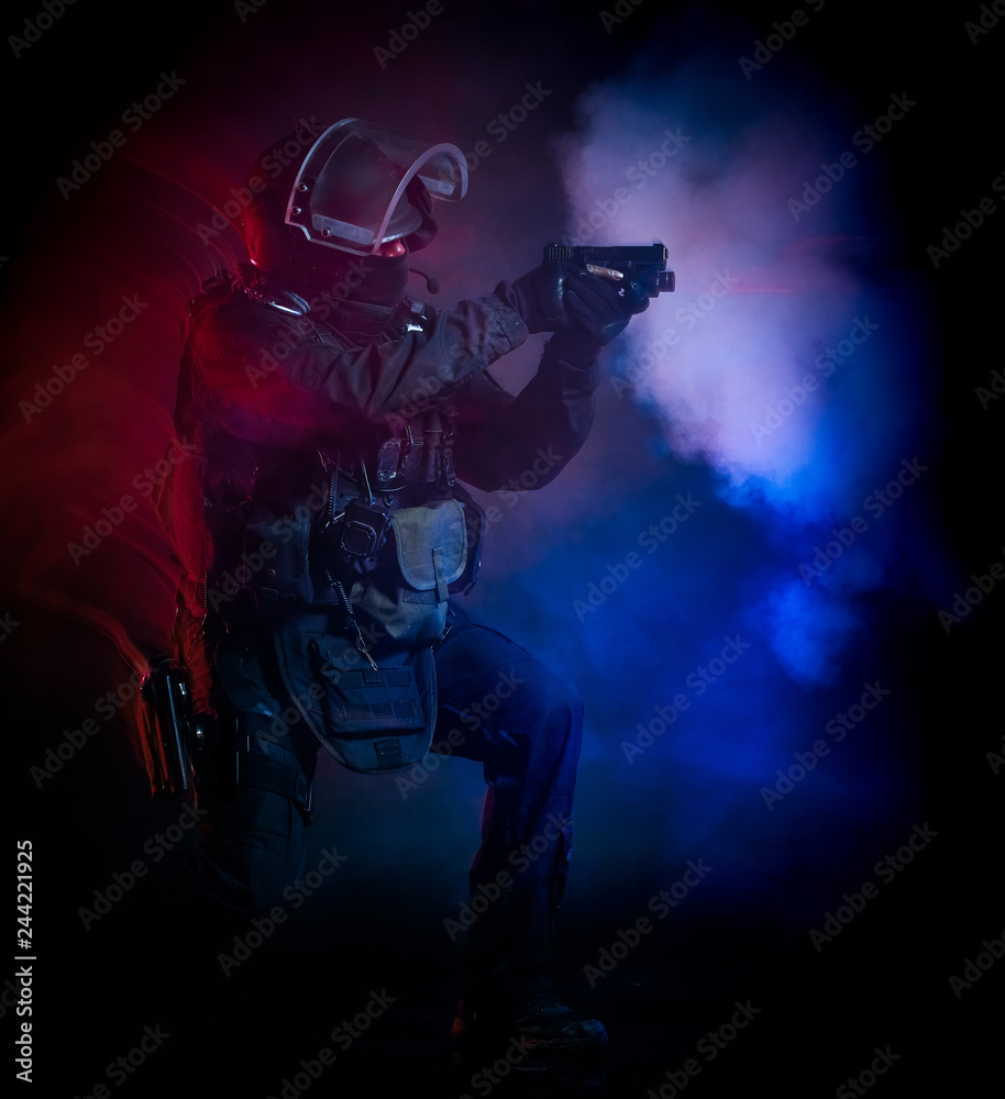 one soldier police swat tactical forces man studio shot  isolated on black background