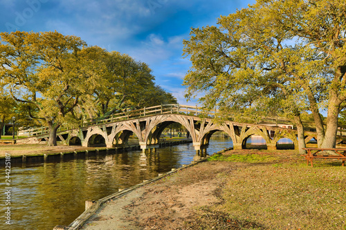 The historic landmark footbridge in Currituck Heritage Park leads to the Whalehead Club. This is located in the Outer Banks of North Carolina. 