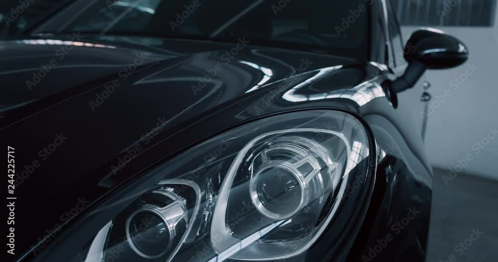 Close up of details of headlights of anonymous prestigious luxury modern car. Shot in 8K. Concept of passion for driving cars and engines, car dealerships, used cars,luxury cars, auto dial Close up of details of headlights of anonymous prestigious luxury modern car. Shot in 8K. Concept of passion for driving cars and engines, car dealerships, used cars,luxury cars, auto dial