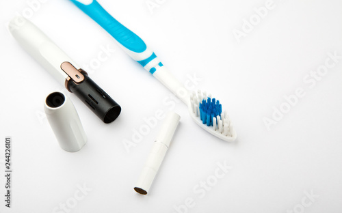  toothbrush electronic smoke device white background nobody  photo