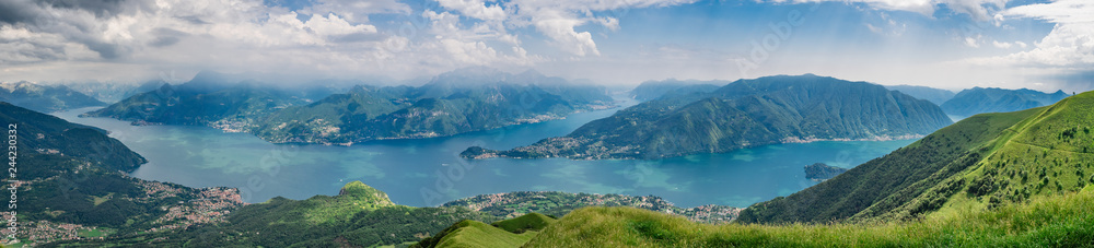 Panoramic view of Lake Como as seen from  Monte Crocione summit, - obrazy, fototapety, plakaty 