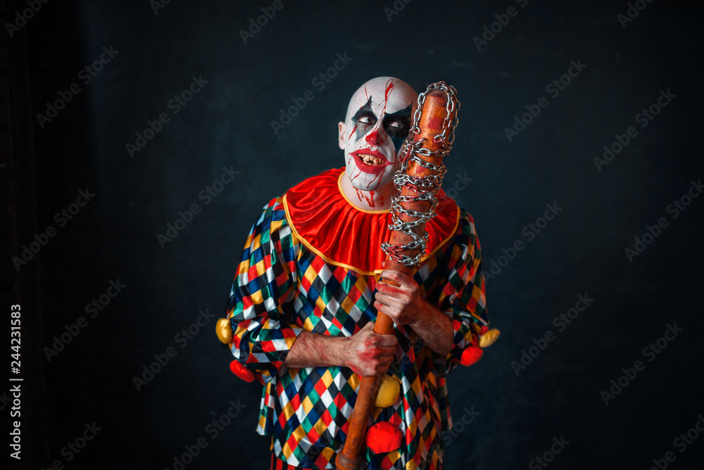 Mad bloody clown with baseball bat Mad bloody clown with baseball bat
