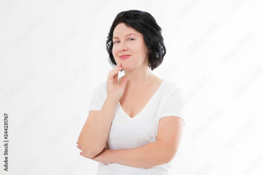Happy middle age woman in summer blank template t shirt isolated on white background. Copy space. Happy middle age woman in summer blank template t shirt isolated on white background. Copy space.