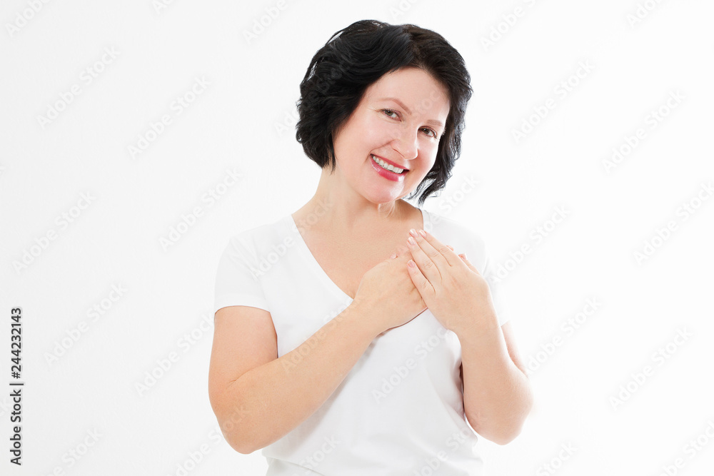 Middle age asian woman touching healthy heart isolated on white background. Feelings and love concept. Valentine day. Copy space Middle age asian woman touching healthy heart isolated on white background. Feelings and love concept. Valentine day. Copy space
