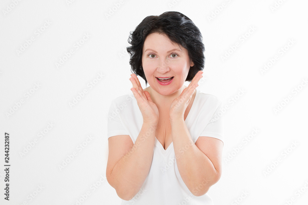 Surprised shocked excited asian middle age woman wrinkle face isolated on white background. Female in blank template summer t shirt. Copy space Surprised shocked excited asian middle age woman wrinkle face isolated on white background. Female in blank template summer t shirt. Copy space