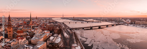 Photography Aerial winter sunset over Riga old town and river Daugava in Latvia