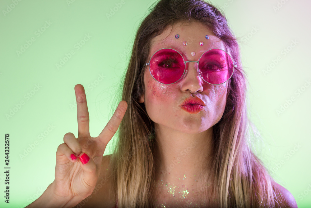 Paradox opwinding Pornografie Carnaval Brazil. Face of young hippie woman with colorful makeup, dressed  up for fun. Colorful background. Carnival concept, fun and party. Stock  Photo | Adobe Stock