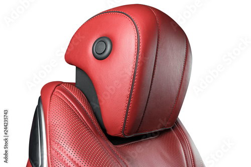 Red leather interior of the luxury modern car. Perforated red leather comfortable seats with stitching isolated on white background. Modern car interior details. Car detailing. Car inside © Aleksei