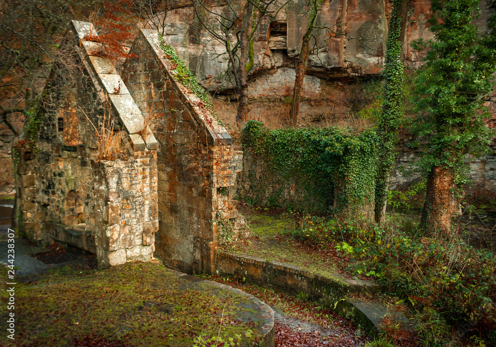 Remains of the Roslin Glen Gunpowder Mills, in East Lothian. Industrial gunpowder mill from the 19th century. Scotland, UK. Rosslyn. Ruins Remains of the Roslin Glen Gunpowder Mills, in East Lothian. Industrial gunpowder mill from the 19th century. Scotland, UK. Rosslyn. Ruins