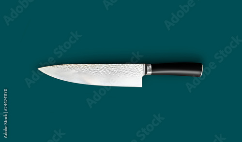 Chef's knife for your kitchen isolated on green