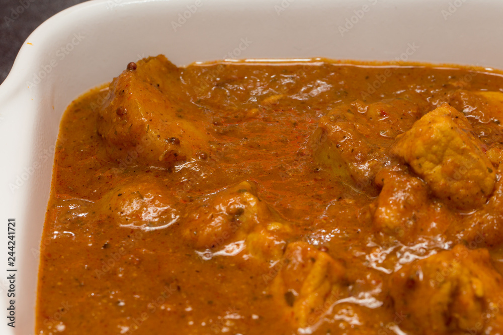 A bowl of spicy homemade pork vindaloo curry