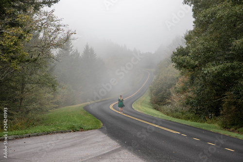 Beautiful woman walking on Blue Ridge Parkway, North Carolina, United States
