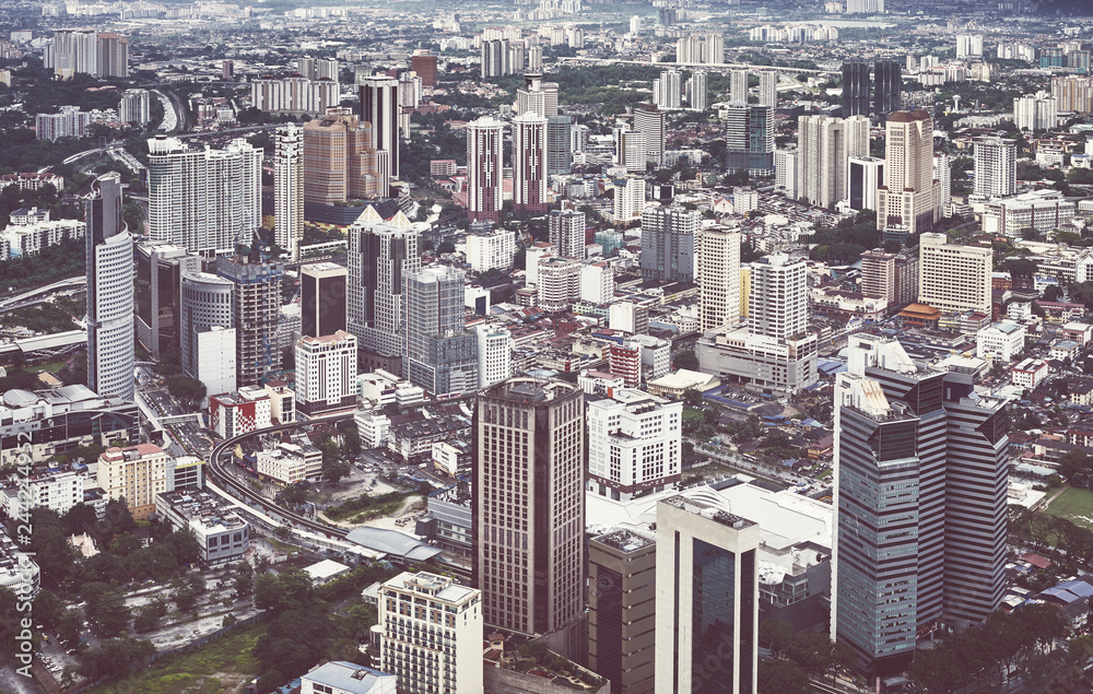 Kuala Lumpur cityscape on a rainy day, color toned picture, Malaysia.