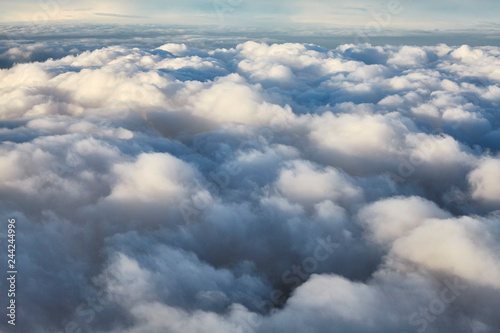 Cloudscape seen through an airplane window.