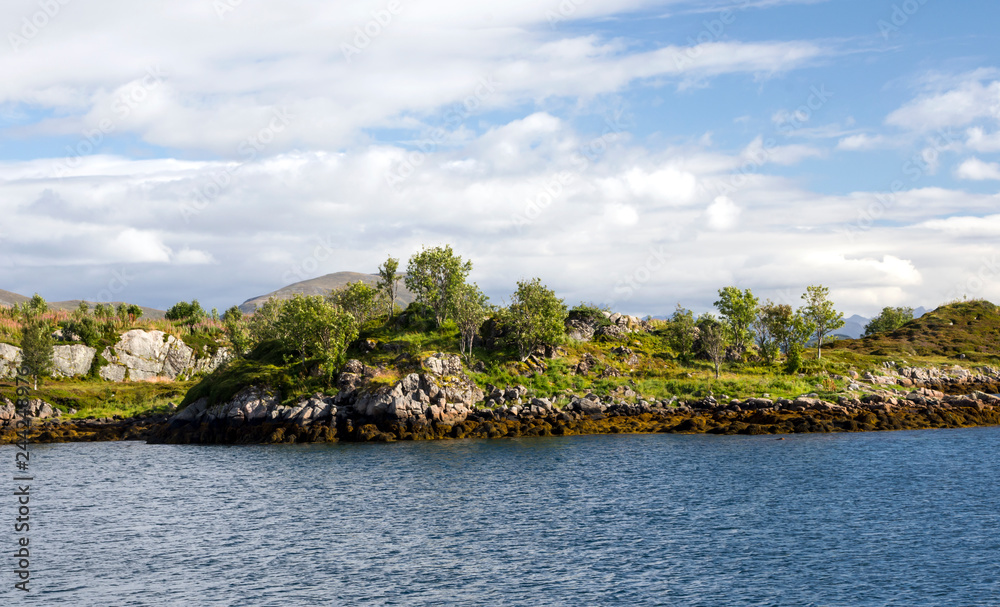 Mountains by the sea in Lofoten, Norway on a cloudy day